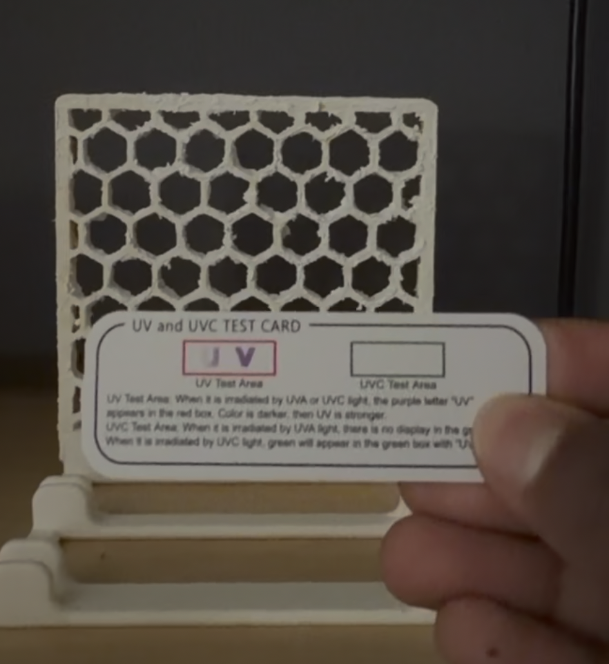Close-up UV blue glow through honeycomb prototype